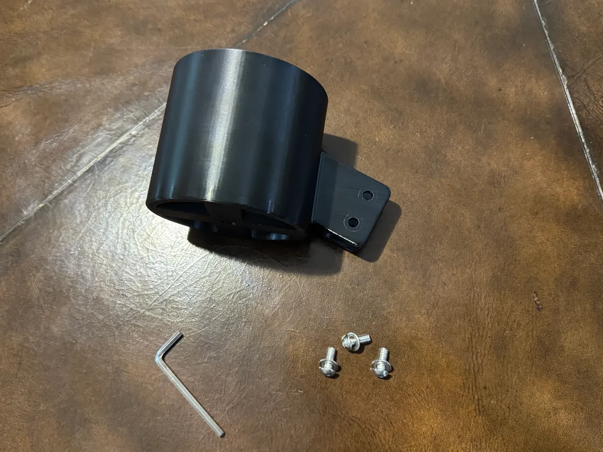 One solid print — cup, bracket, and drain slots, no moving parts